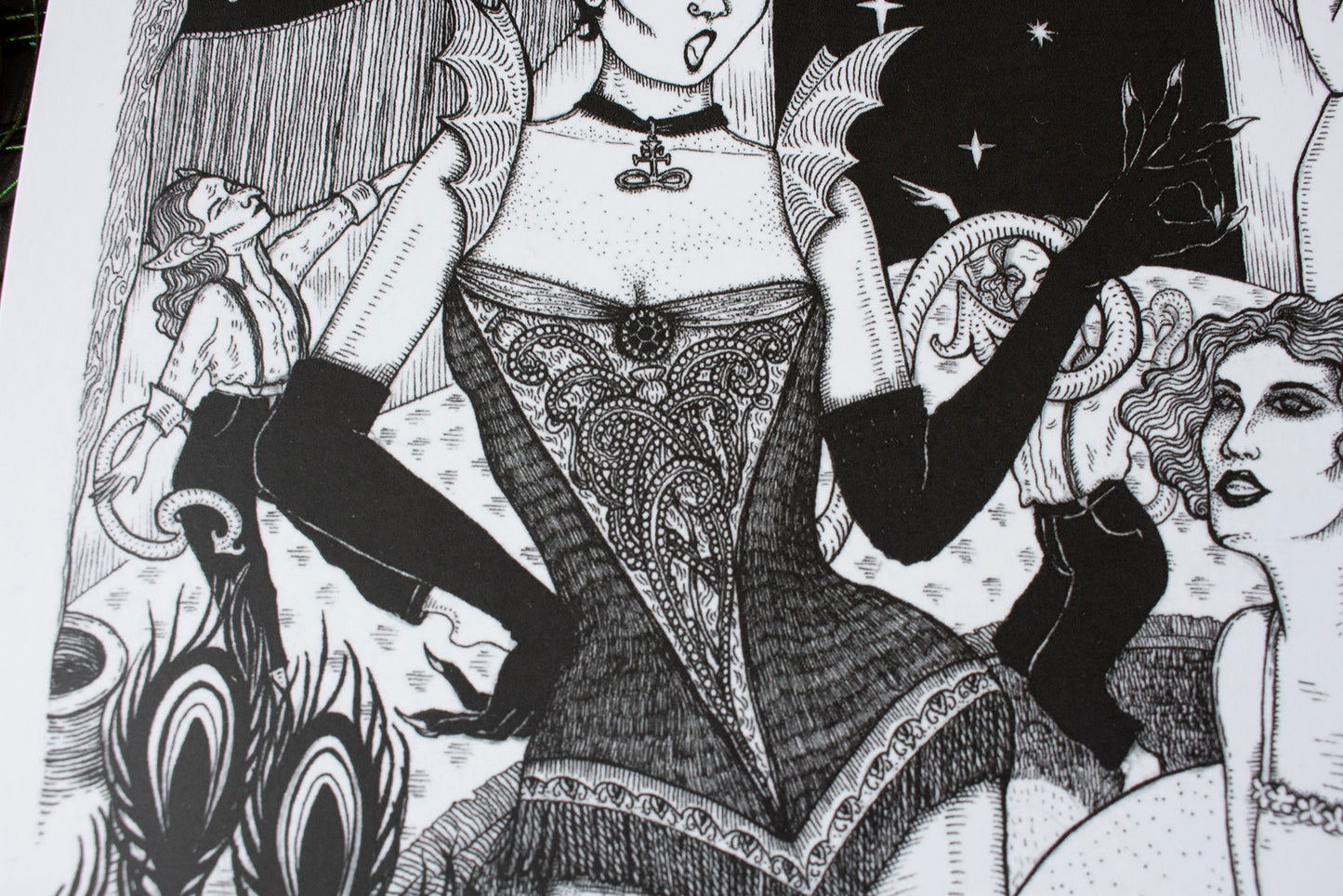 The devil in my boudoir print detail focusing on the devil's dress