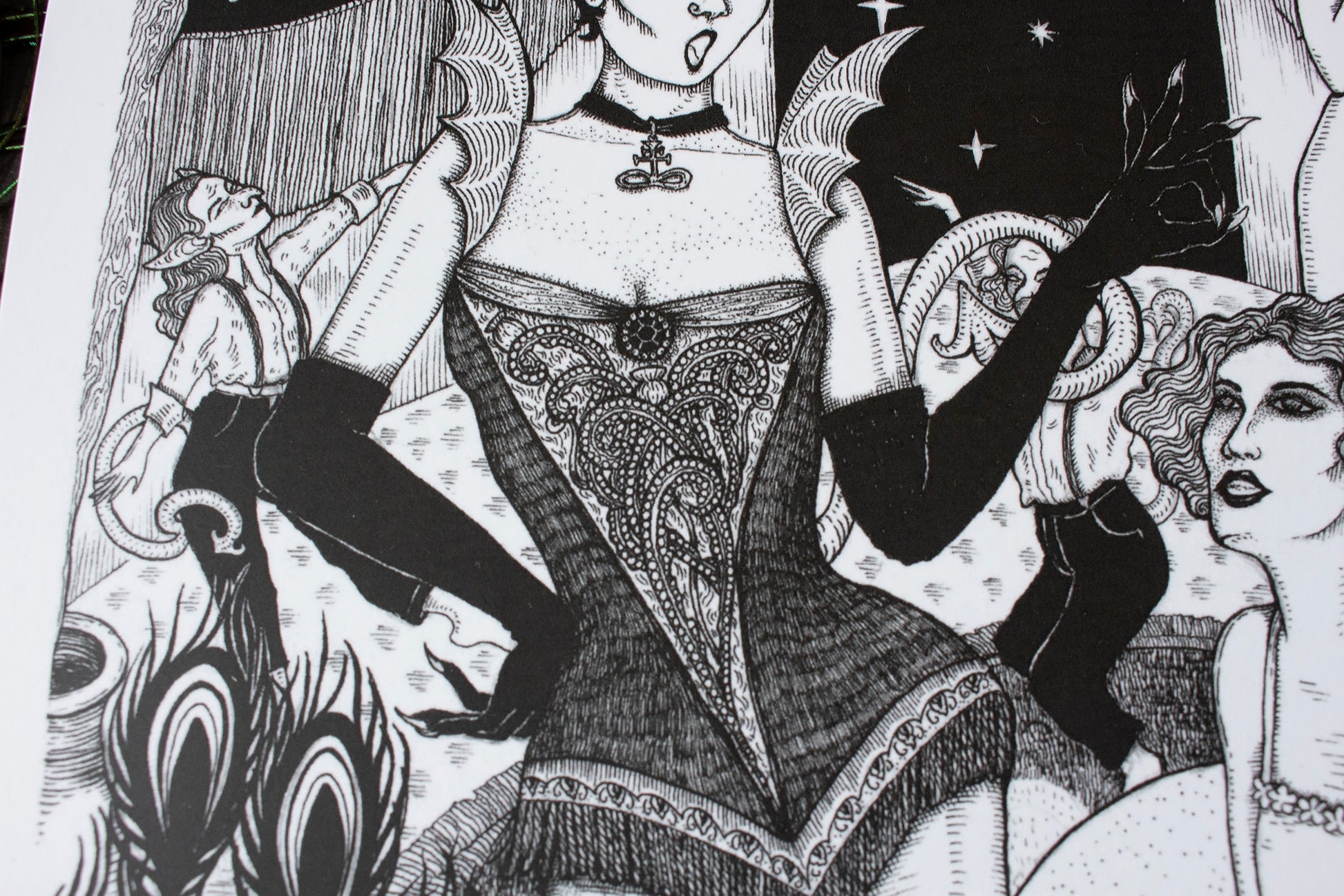The devil in my boudoir print detail focusing on the devil's dress